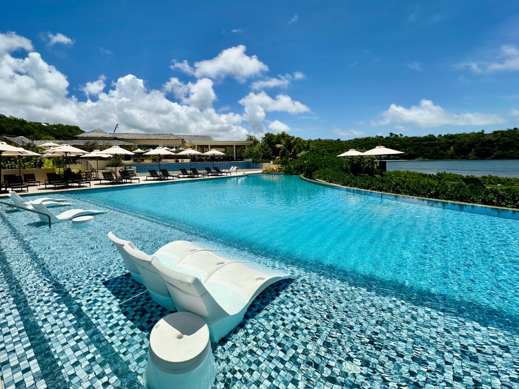 Relaxing pool side at the Six Senses Grenada